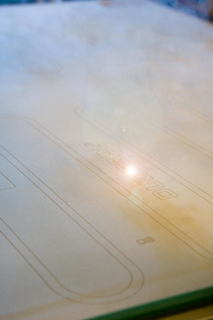 Messana being engraved in radiant panel (Radiant Cooling Technology)