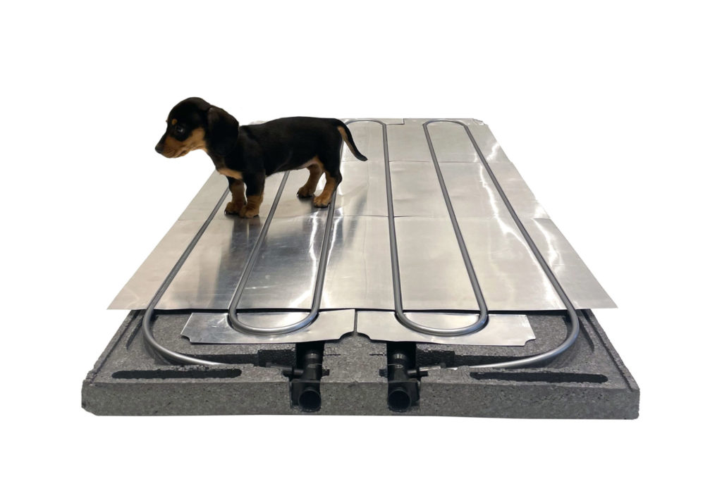 Penny on a Ray Magic® NK Radiant Cooling and Heating Ceiling Panel.