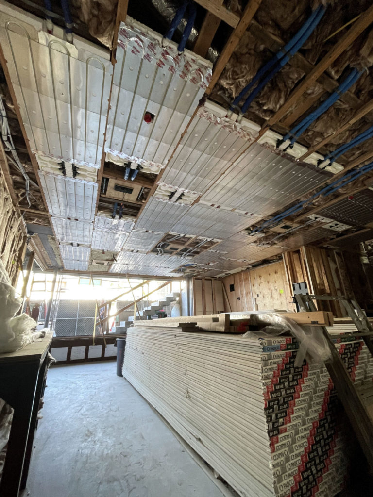 Our Ray Magic® radiant ceiling panels ready to be covered by drywall to provide radiant cooling and radiant heating.