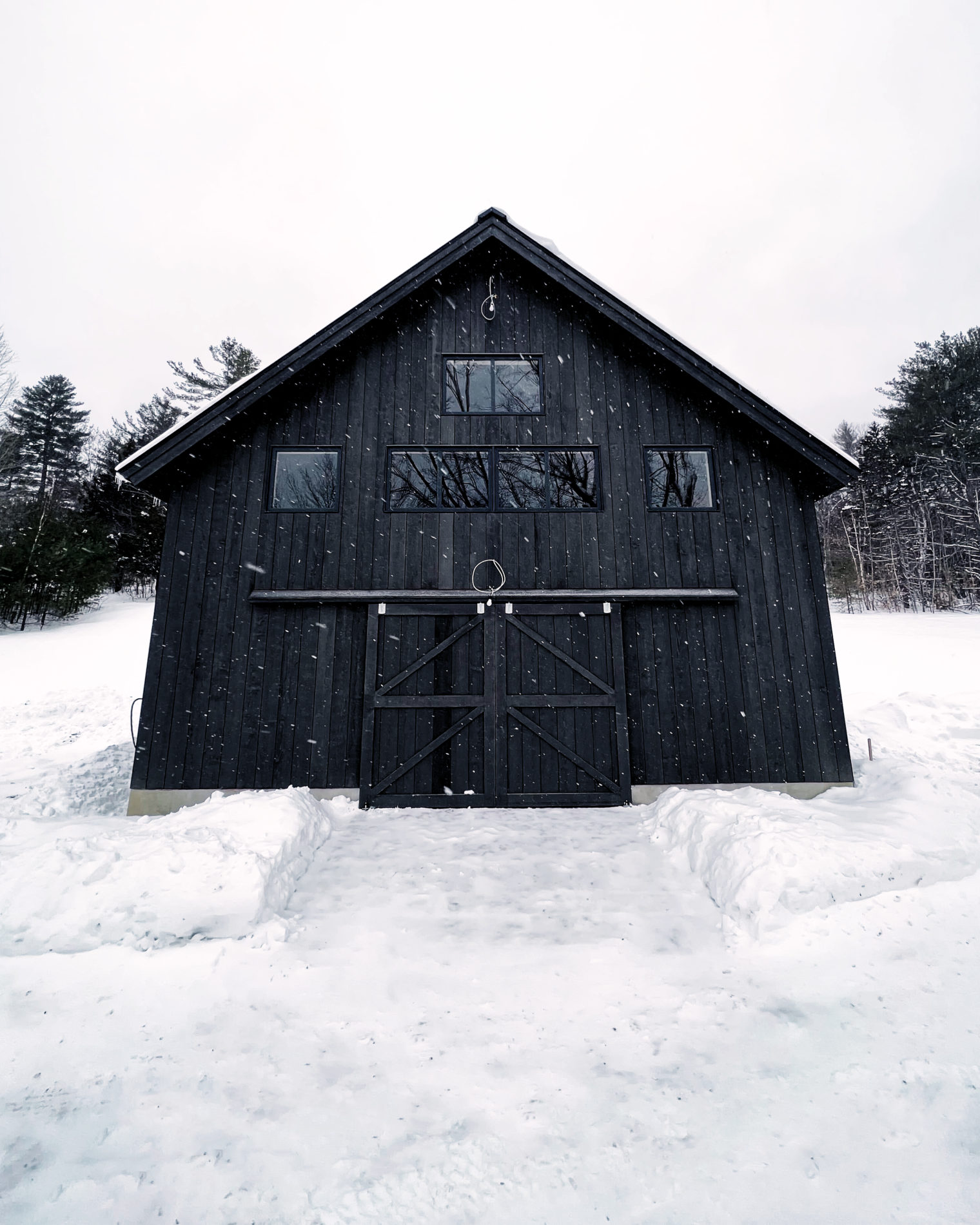 New Hampshire barn that uses a radiant floor for both heating and cooling, managed via Messana mControls.