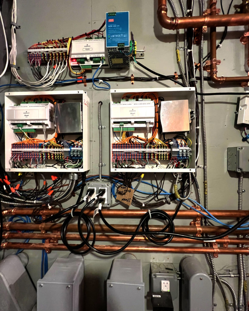 Messana mControls hydronic controllers installed in the mechanical room to manage the entire hydronic system.
