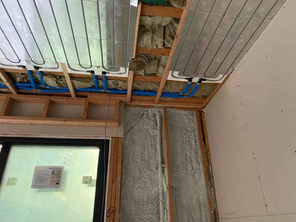 Ray Magic® NK radiant ceiling panels connected to pre-insulated PEX supply and return lines.